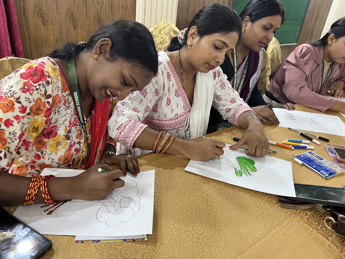 Participants drawing and learning together during a community session
